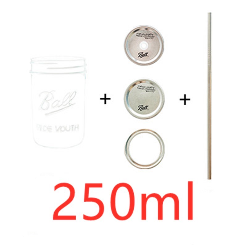 Mason bottle with a mason glass juice drink straw water glas